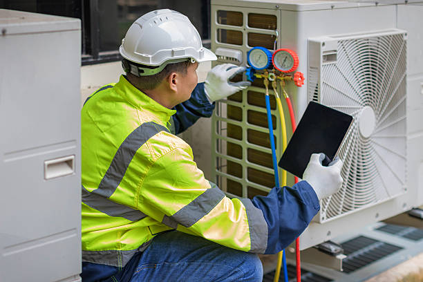 Professional Emergency Ac Repair technician working in Little Falls, MN